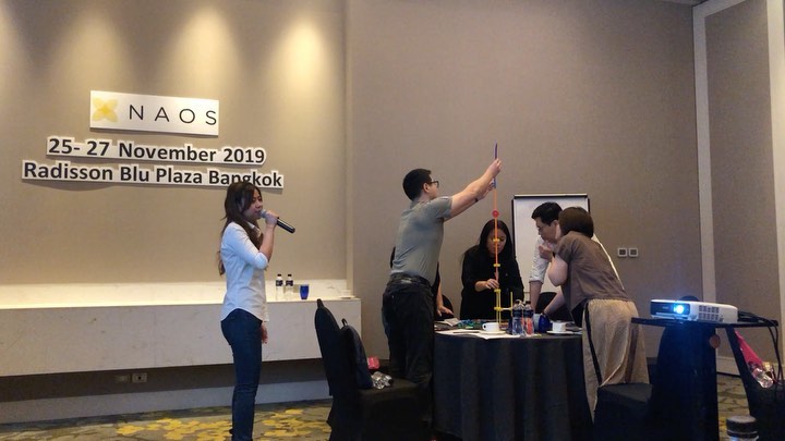 June Siriruk MCing corporate event at Radisson Blu Bangkok