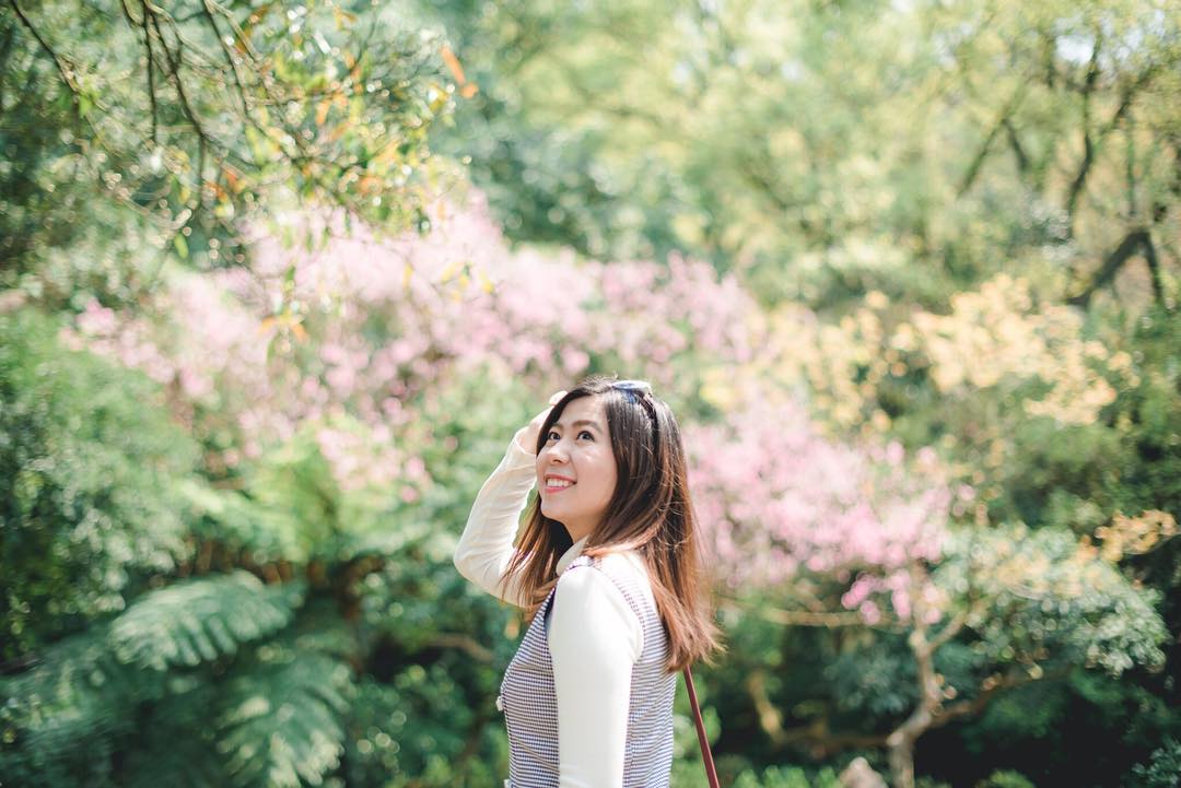 June Siriruk portrait among cherry blossoms